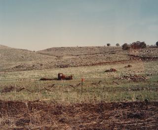 Destroyed convoy behind minefield