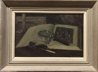 Stilleven met boek en vergrootglas